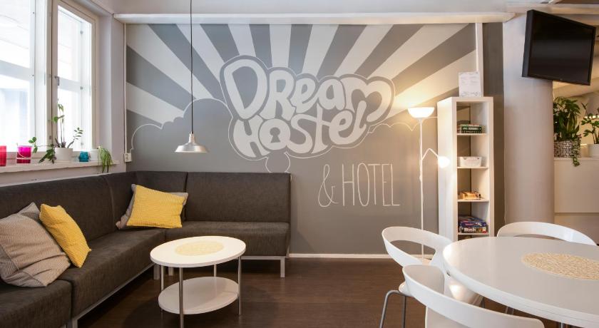 a living room with a couch and a table, Dream Hostel Tampere in Tampere