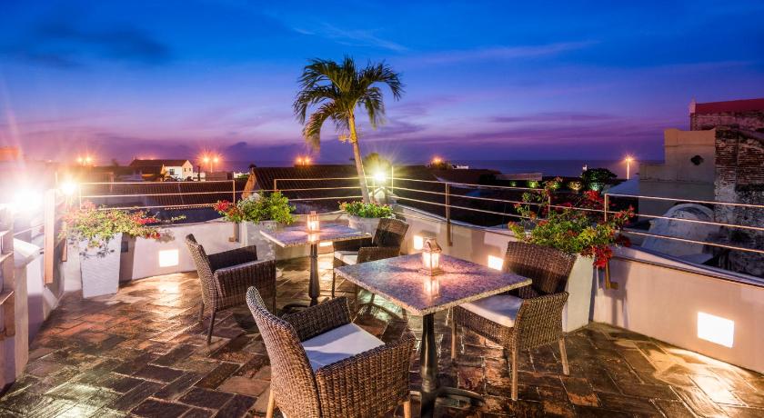 Ananda Hotel Boutique - Hoteles Cosmos