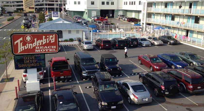 a parking lot filled with lots of cars and trucks, Thunderbird Beach Motel in Ocean City (MD)