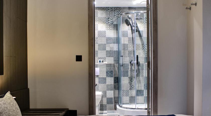 The District Hotel in St. Julian's - Room Deals, Photos