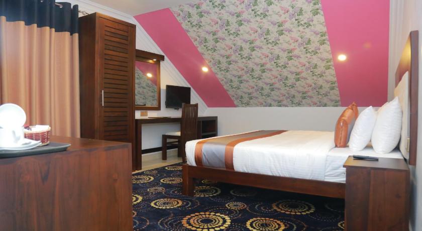 صورة غرفة ديلوكس مزدوجة مع نافذة وتصميم على طراز عليّة (Deluxe Double Room with Window and Attic Style) 3