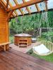 Forest house with outdoor hot tub