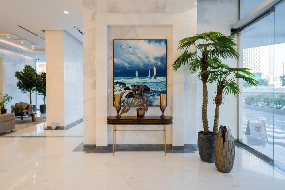 Kasco Homes Holidays LLC - Waves Tower Business Bay