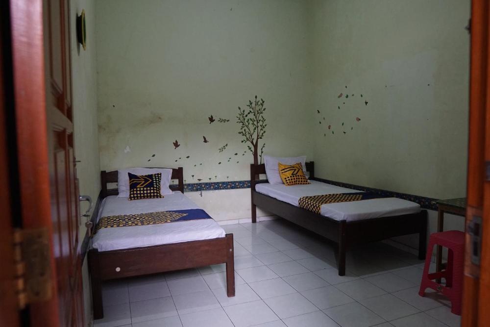 spot on 92665 yoko kost syariah