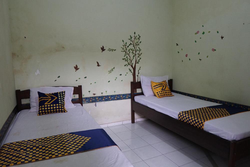 spot on 92665 yoko kost syariah