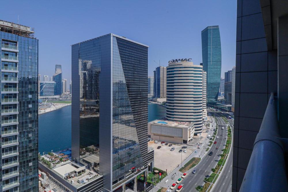 Tranquil stay I Dubai Canal view I Steam and sauna