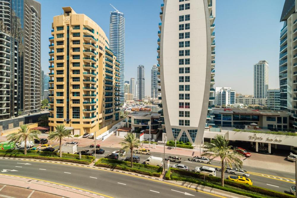Beautiful 2BR & 4BR Apartments on JBR Beach, Walking Distance to Bluewaters Island - By Sunkissed Ho