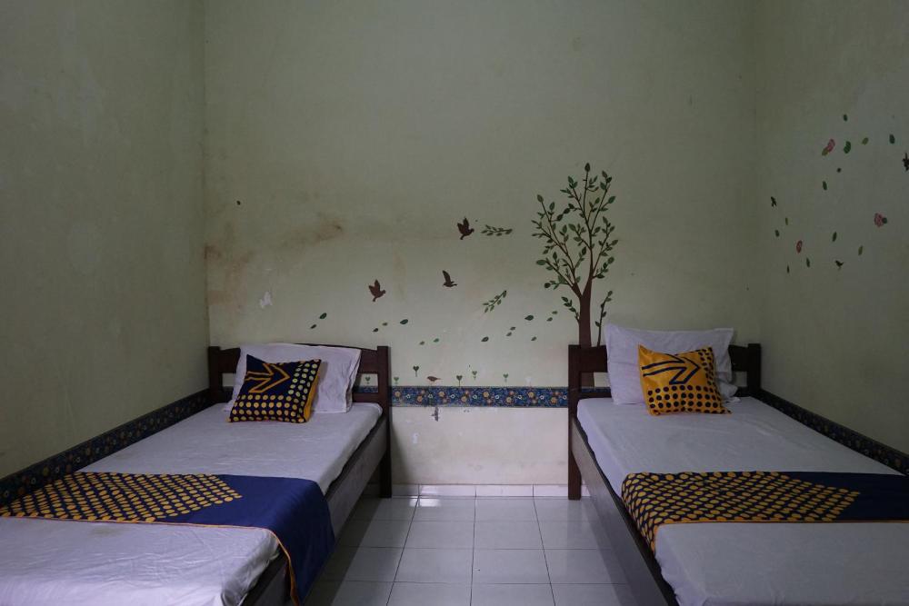 spot on 92665 yoko kost syariah