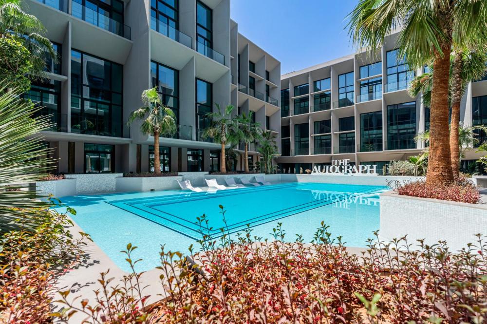 Escape24 Cozy Studio with Pool View in JVC