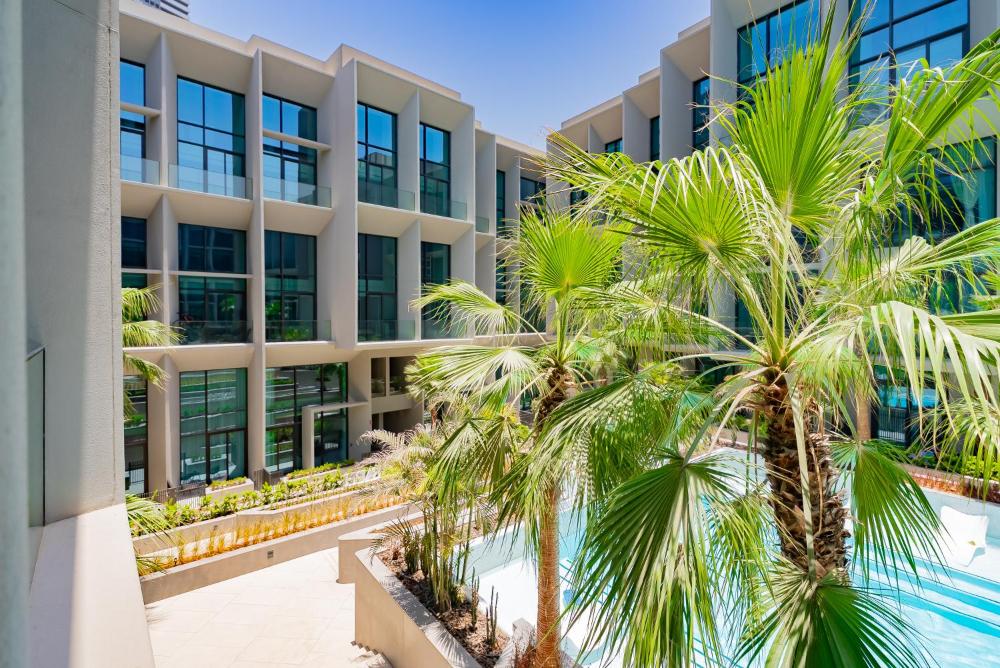 Escape24 Cozy Studio with Pool View in JVC