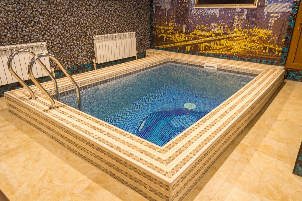 Salut Hotel Almaty - Tap to explore photos