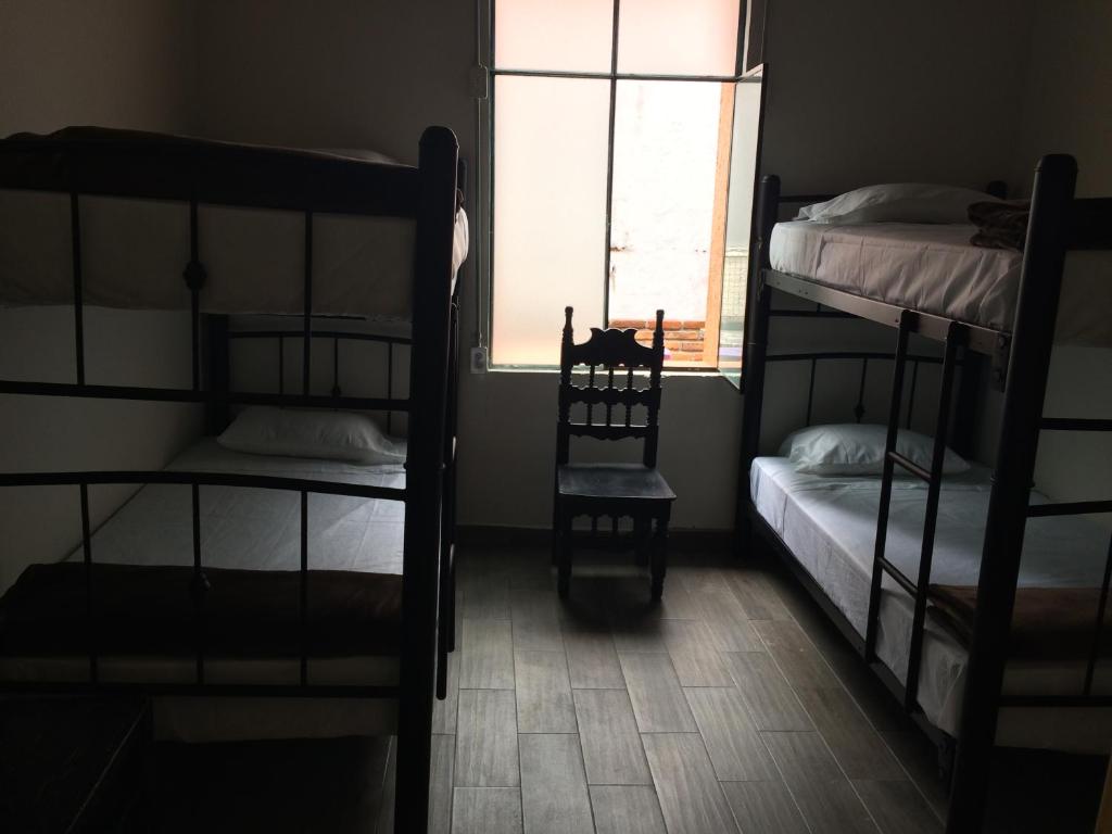 Номер (Кровать в общем 4-местном номере для мужчин и женщин), Capsule Hostel