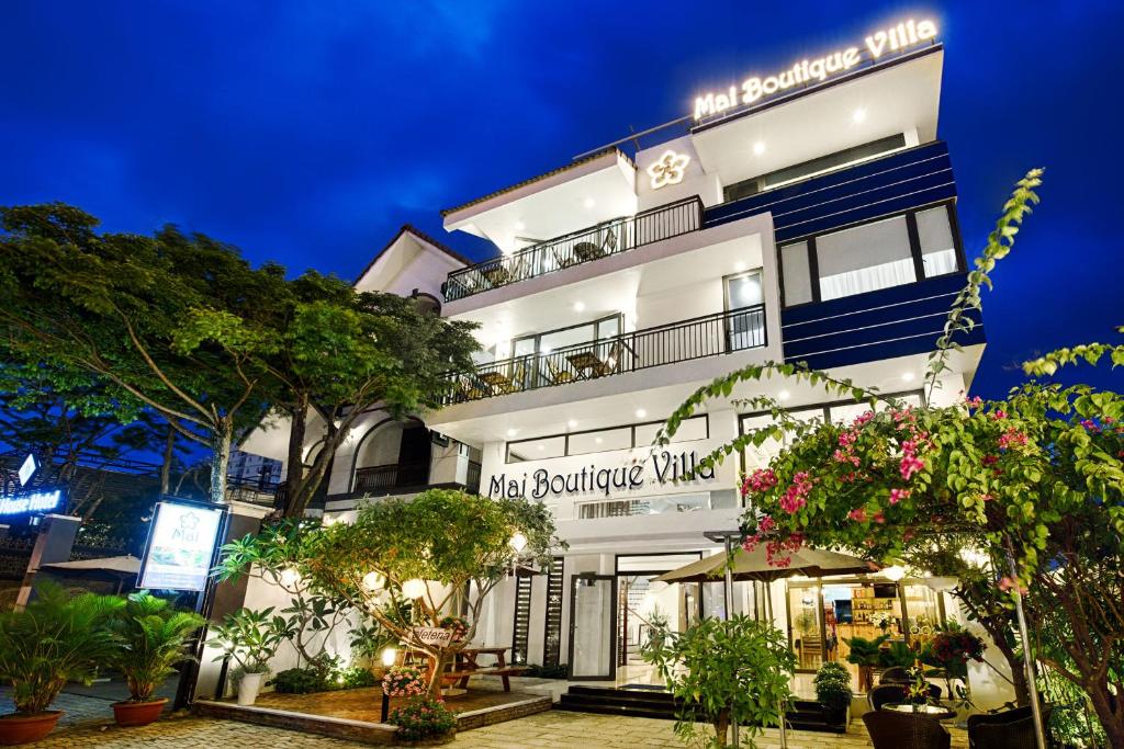 Mai Boutique Villa - Tap to explore photos