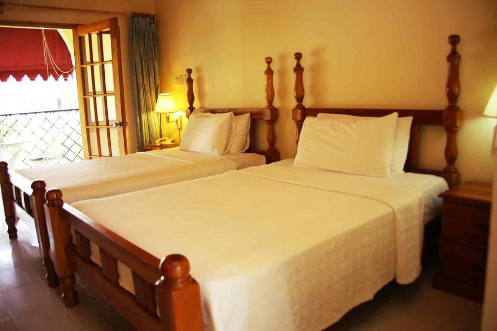 Charela Inn Hotel - Tap to explore photos