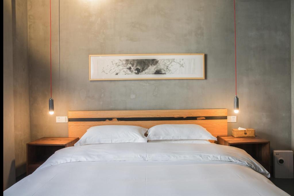 Двухместный (Двухместный номер с 1 кроватью, вид на сад), Hangzhou Yushu Hostel