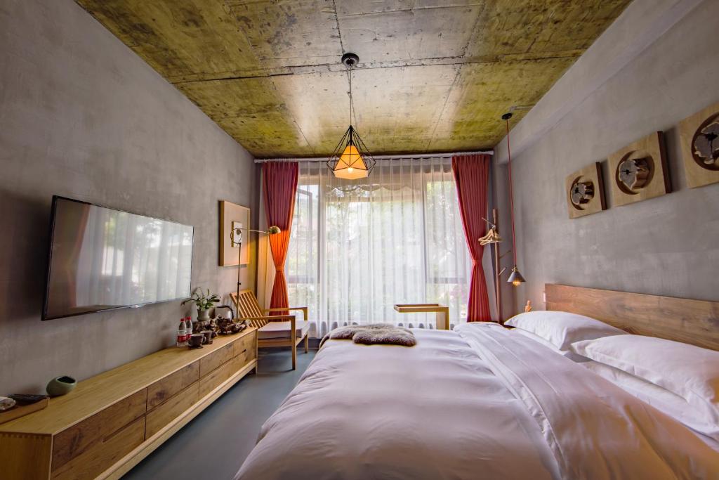 Двухместный (Двухместный номер с 1 кроватью, вид на сад), Hangzhou Yushu Hostel