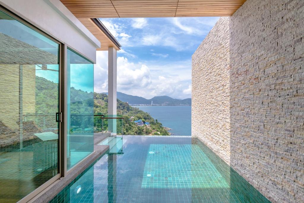 Вилла (Вилла с частным бассейном и видом на море), Курортный отель Wyndham Grand Phuket Kalim Bay