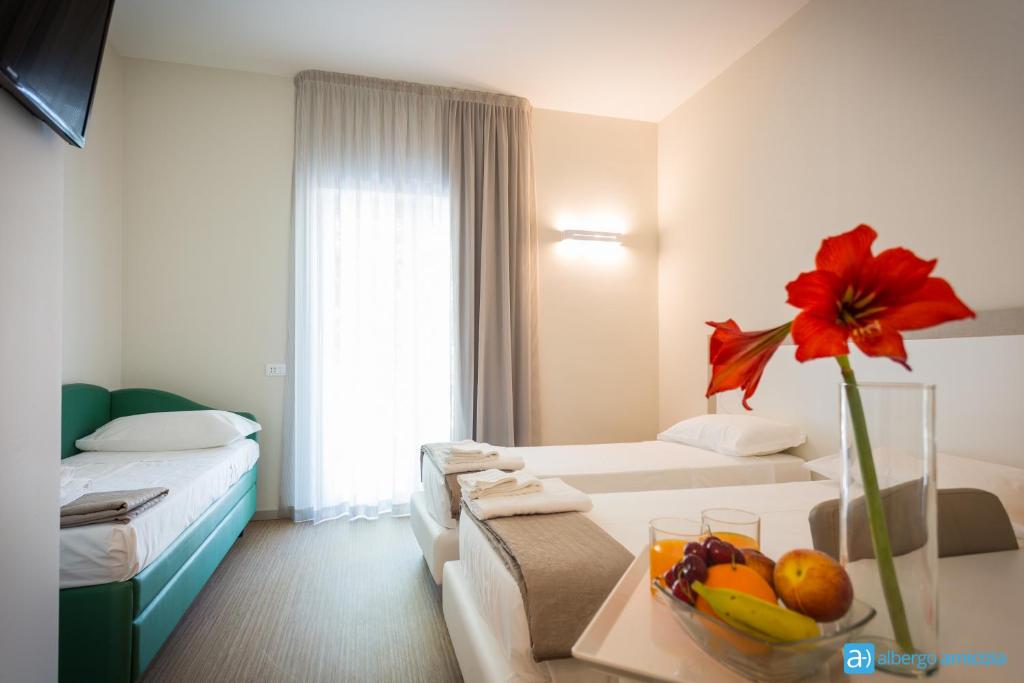 Hotel Amicizia Rimini - Tap to explore photos