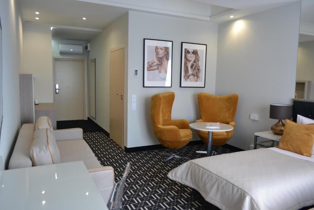 Двухместный (Просторный двухместный номер с 2 отдельными кроватями), Hotel Atelia