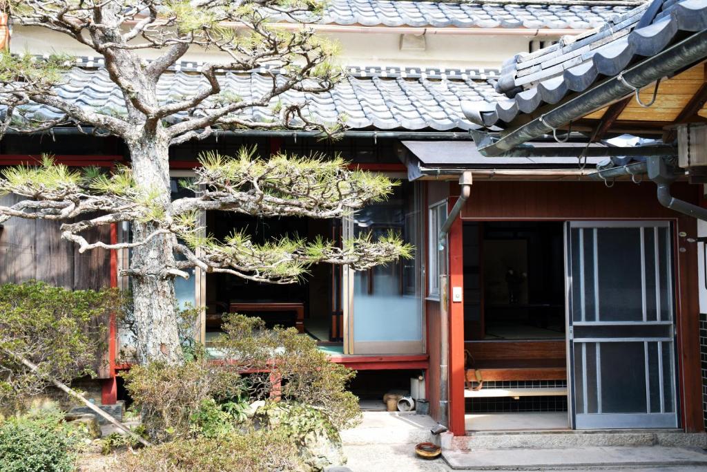 Guesthouse En photo 1