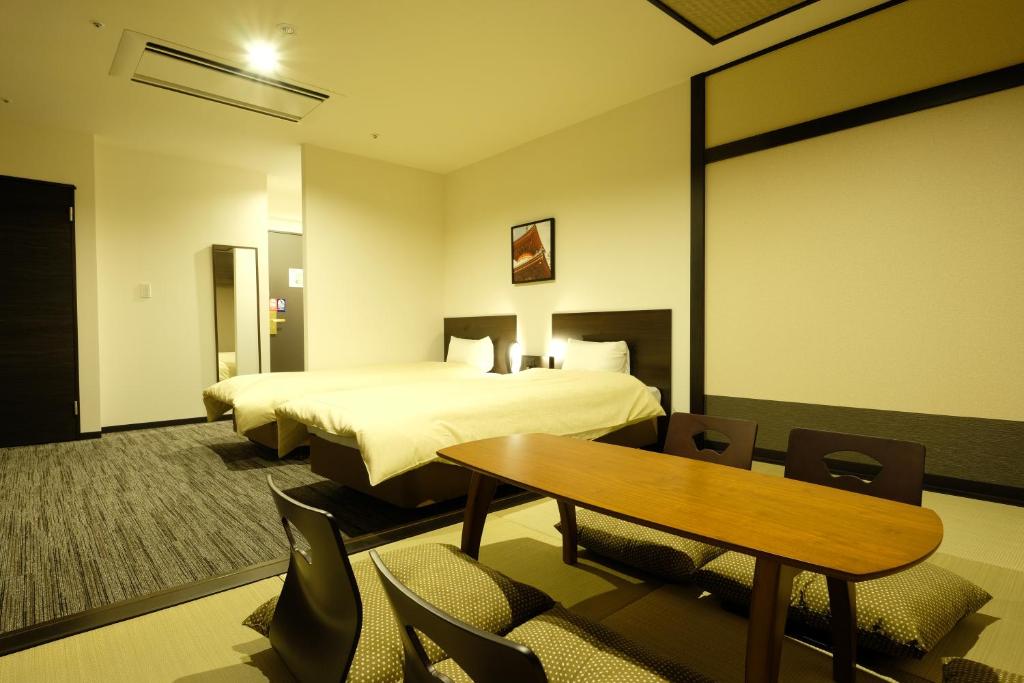 The Premium Hotel in Rinku - Tap to explore photos