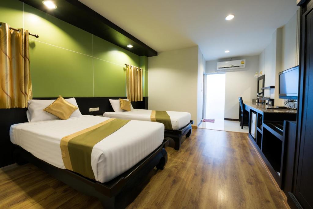 Diamond Park Inn Chiang Rai Resort - Tap to explore photos