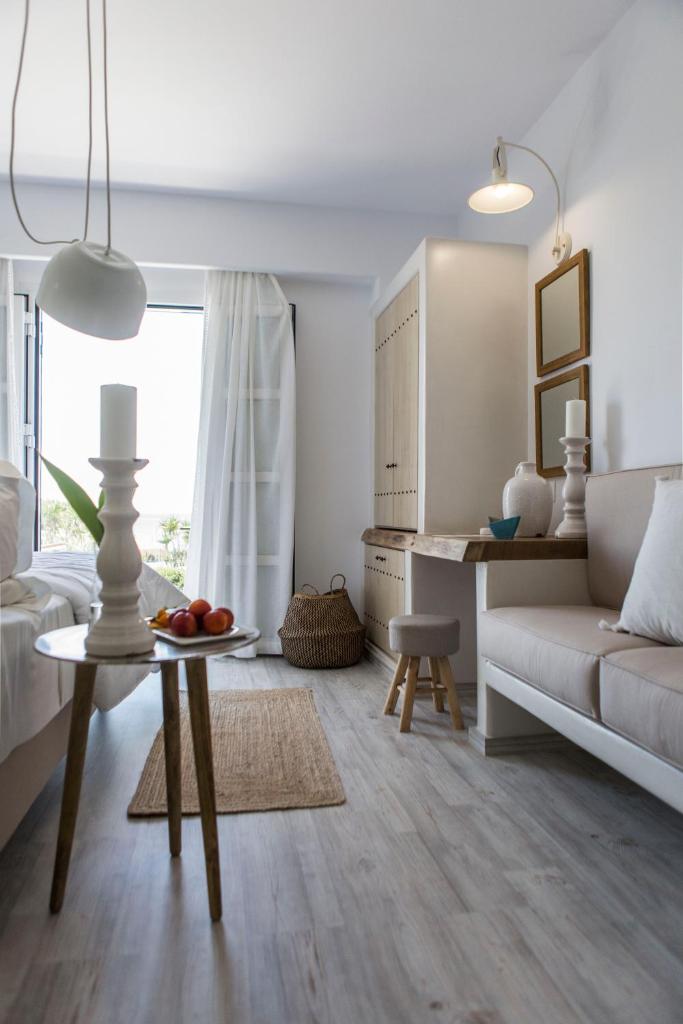 Athina Studios & Suites - Tap to explore photos