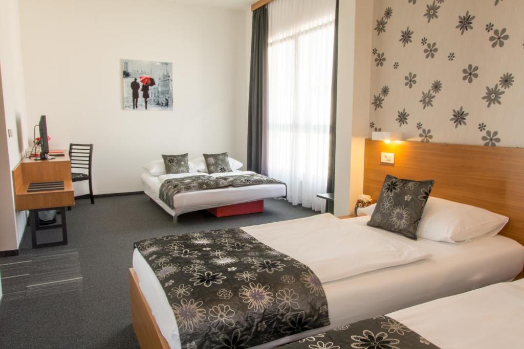 Сьюит (Полулюкс (для 4 взрослых) с собственной ванной комнатой), Hotel Delminivm
