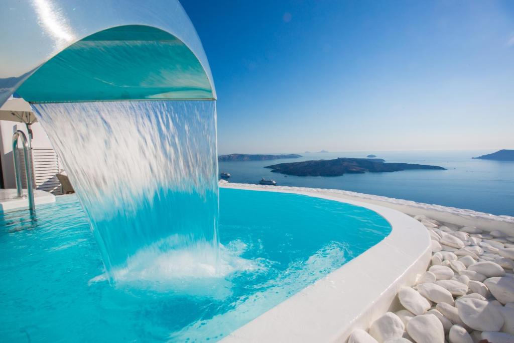 Chic Hotel Santorini - Tap to explore photos