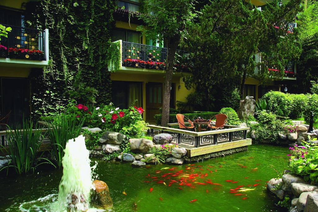 Двухместный (Двухместный номер с 1 кроватью, вид на сад), Jianguo Hotel