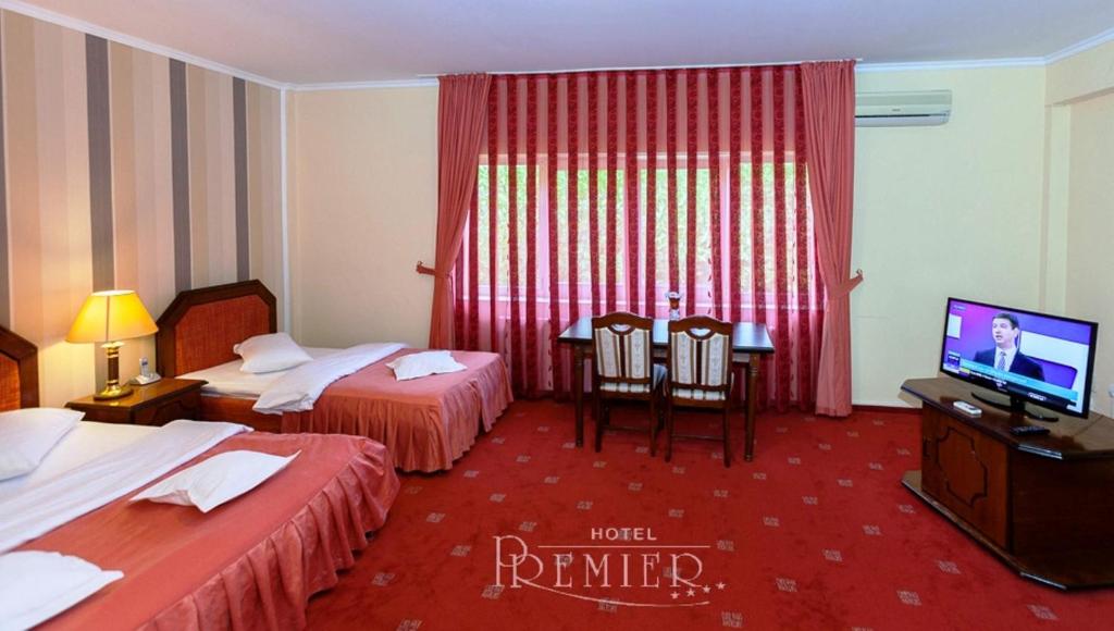 Hotel Premier - Tap to explore photos