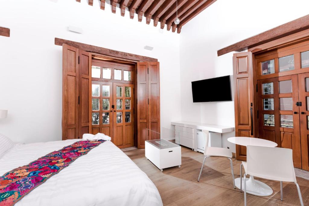 Двухместный (Двухместный номер Делюкс с 1 кроватью и балконом), Domingo Santo Hotel Boutique