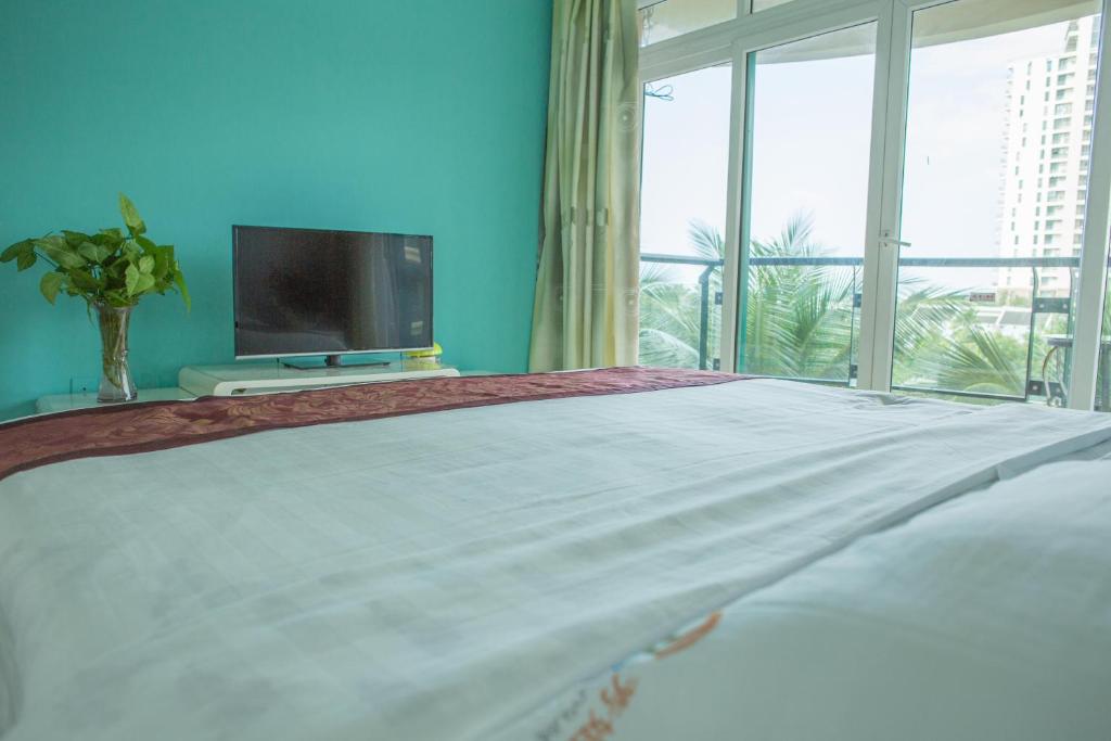 Апартаменты (Апартаменты с 3 спальнями и видом на сад), Sanya Yusi Huike Apartment