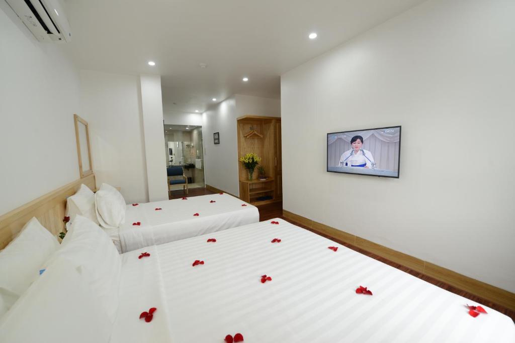 Семейный (Семейный люкс, вид на город), Blue Hanoi Inn City Hotel