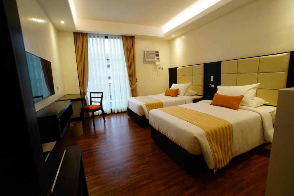 Hotel Oazis Butuan - Tap to explore photos