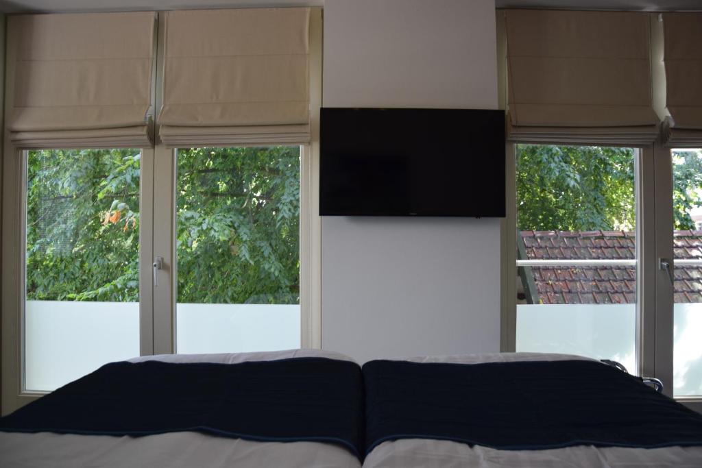 Двухместный (Двухместный номер Делюкс с 1 кроватью или 2 отдельными кроватями и французским балконом), Hotel Restaurant Koekenbier Abcoude