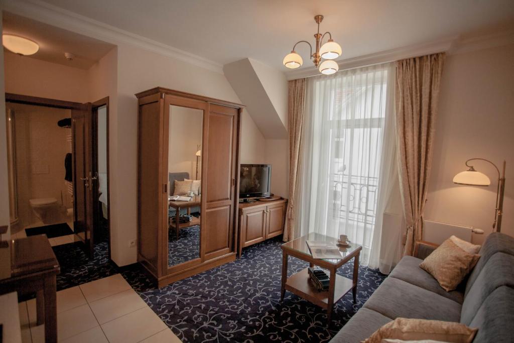 Апартаменты (Стандартные апартаменты B с 1 спальней и балконом), Apartamenty Villa Artis