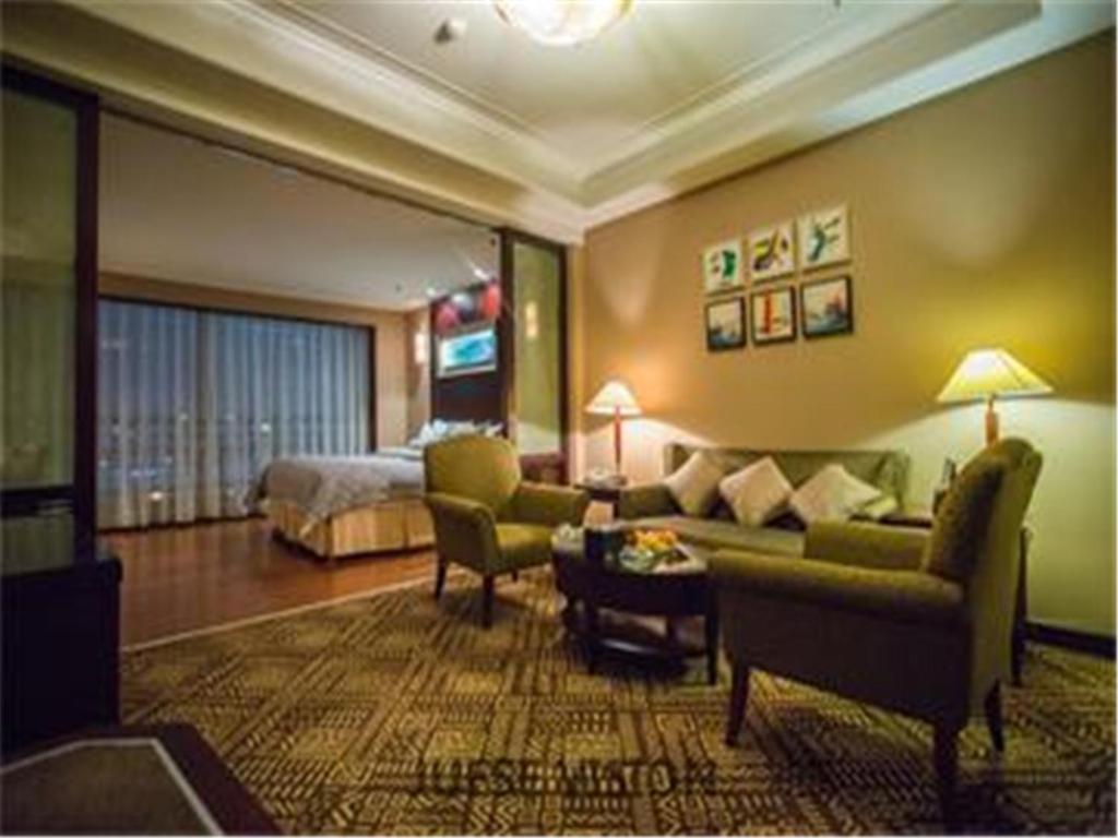 Двухместный (Двухместный номер Делюкс с 1 кроватью), Qingdao Blue Horizon Hotel - Laoshan