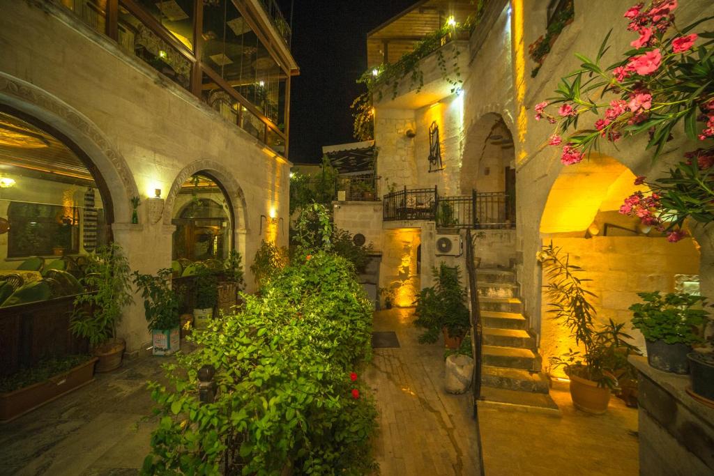 Hidden Cave Hotel - Tap to explore photos
