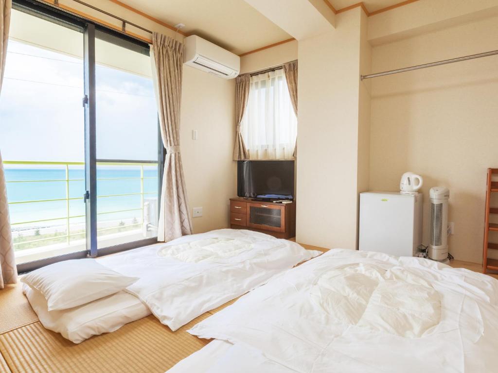 Kariyushi Condominium Ocean Hills Chouraku Stay