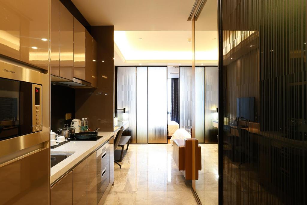 Двухместный (Номер-студио Делюкс с 2 отдельными кроватями), Boman Holiday Apartment Jie Deng Du Hui Branch