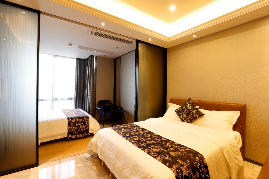 Двухместный (Номер-студио Делюкс с 2 отдельными кроватями), Boman Holiday Apartment Jie Deng Du Hui Branch