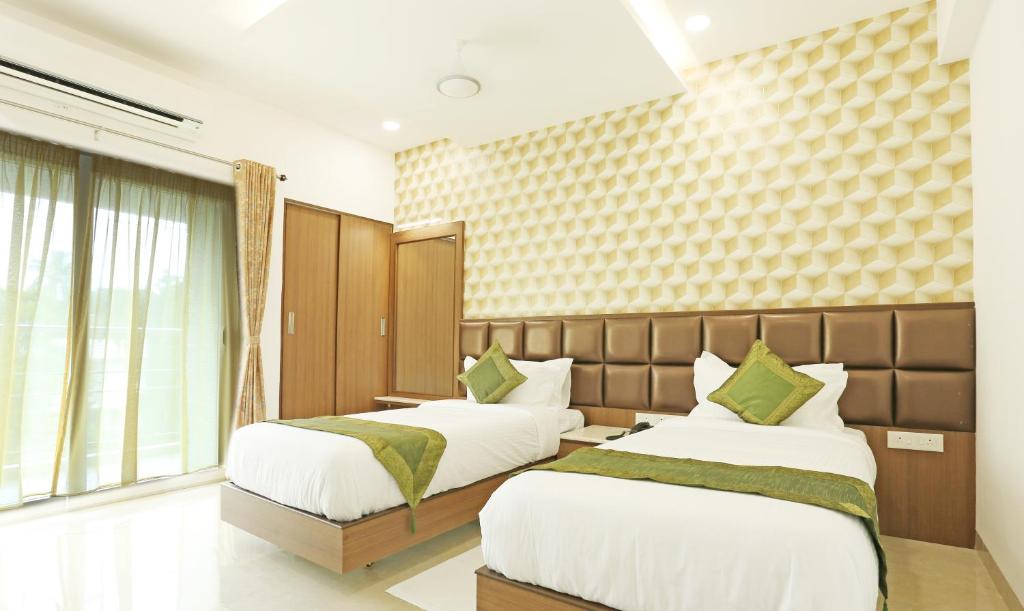Двухместный ([Sanitized] Deluxe Double Room), Treebo Pechis Castle