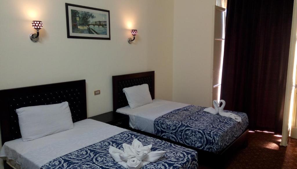 Трехместный (Трехместный номер Делюкс), Cairo Paradise Hotel