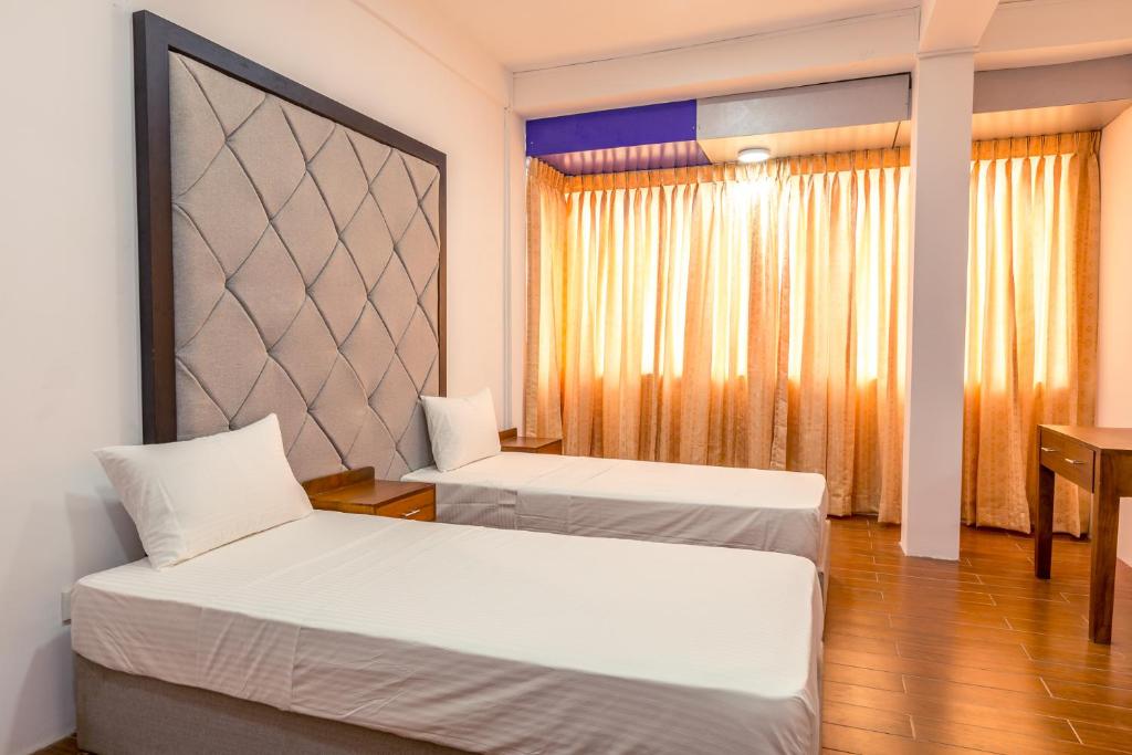 Двухместный (Двухместный номер Делюкс с 1 кроватью и балконом), Metro Port City Hotel