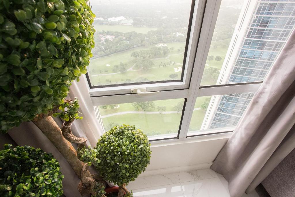 Апартаменты (Апартаменты с 2 спальнями), Oasis Regency @ Fort Victoria BGC