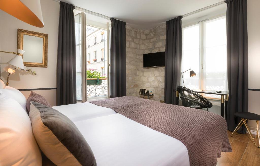 Двухместный (Улучшенный двухместный номер с 1 кроватью), Hôtel Jeanne d'Arc Le Marais