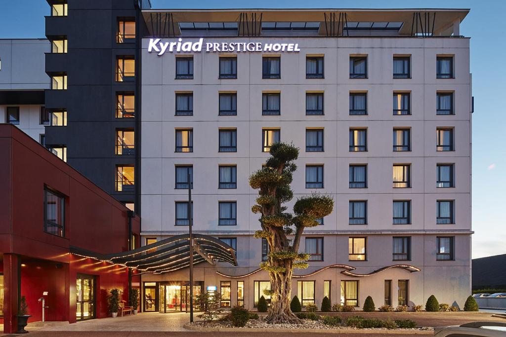 Kyriad Prestige Lyon Est - Saint Priest Eurexpo Hotel and SPA photo 1