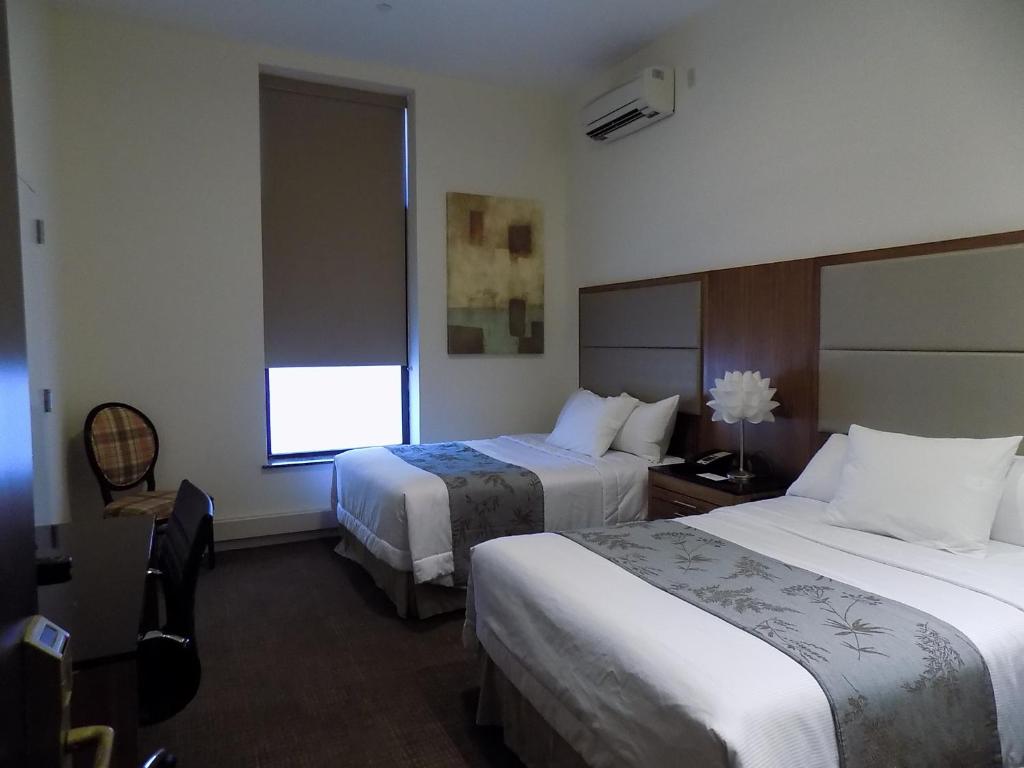 Четырехместный (Четырехместный номер с собственной ванной комнатой), Americana Inn
