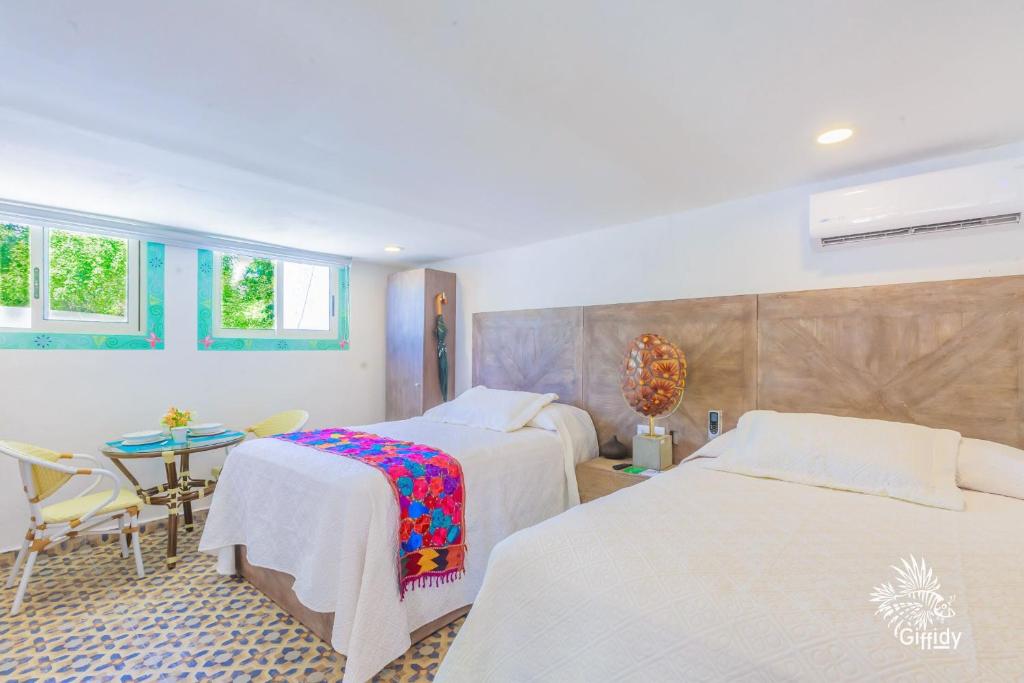 Сьюит (Двухместный номер Делюкс с 2 двуспальными кроватями), Hotel Paradise Suites